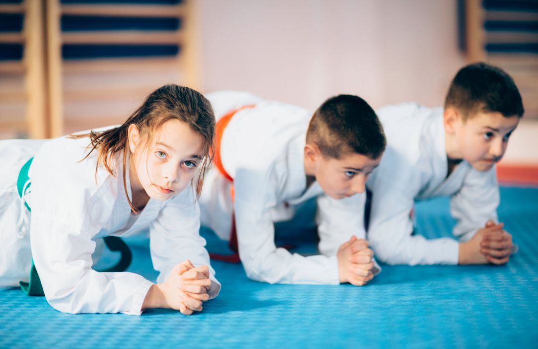 Martial arts kids planking